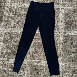 Athleta Salutation Stash 7/8 Tight Leggings. Size— XS. Color— Navy.